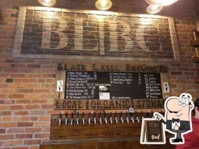 Saranac Commons-A large, open, beautifully-designed space shared by six vendors: Black Label Brewing Company, Boots Bakery, Hatch Beaker and Burr, and Peace Pie. Only 1.5 blocks from Downtown Luxe-an easy 4 minute walk.