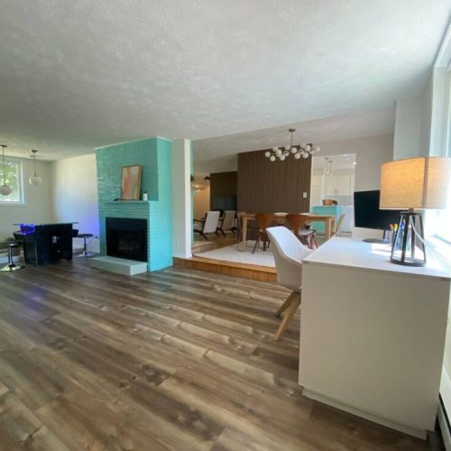 Second living room with Arcade game table, Office desk, Library console table, and Italian leather sofa