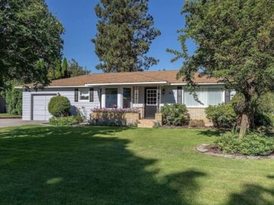 Welcome to Our Mid-Century Home | Nestled in a Quiet Neighborhood for serenity and a sense of belonging experience.