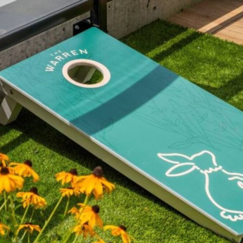 The rooftop deck is the perfect space to play outdoor games, read, or enjoy sitting in the sun.