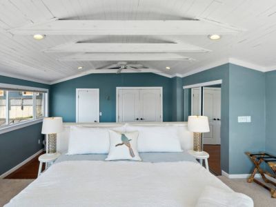 This luxurious bedroom is a haven of serenity, designed to offer an unparalleled connection with nature.