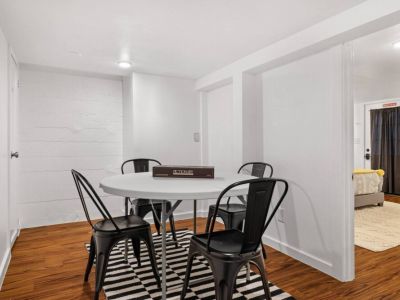 Discover the versatility of our space with an additional dining and/or game and puzzle table, perfect for entertaining and leisurely activities.