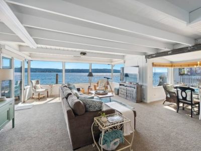 Whether you're curled up with a book, sharing stories with loved ones, or simply losing yourself in the ocean's timeless beauty, this living room with an ocean view is a sanctuary where everyday stresses melt away, leaving you refreshed and inspired
