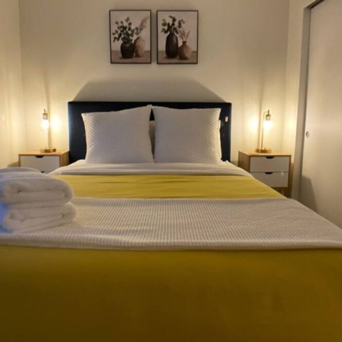 A restful haven as our queen bed beckons with unparalleled comfort and tranquility.