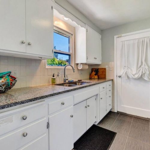 Prepare to be captivated by our newly remodeled kitchen, boasting exquisite granite countertops that add a touch of timeless elegance.