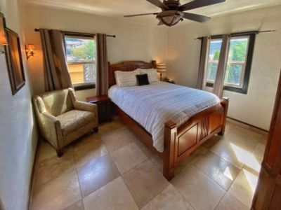 Naturally brightly lit upstairs Queen bedroom has rave reviews for quality matress and linens.