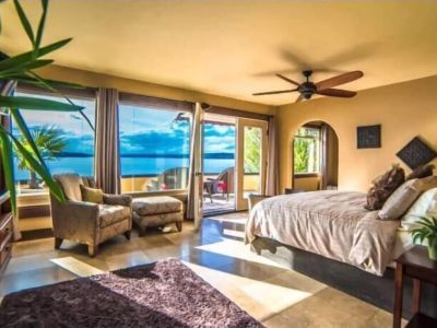 Wake up to this view in the King En Suite with its wall of windows. What a great way to start your day!