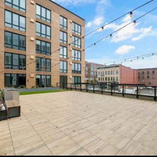 Enjoy the spacious rooftop deck for grilling out or hanging out.