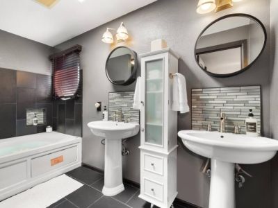 The spacious and beautifully designed the en suite full bathroom of the king bedroom.