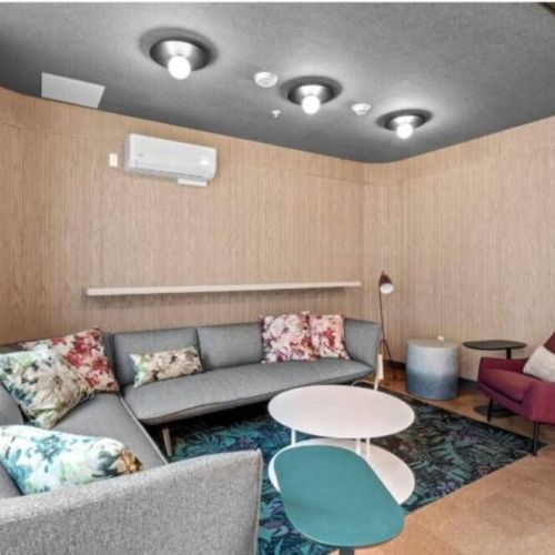 This common living room area transforms into a vibrant hub of shared experiences and connections.