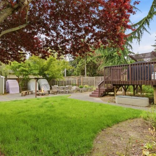 Pets and kids enjoy the fully fenced backyard.