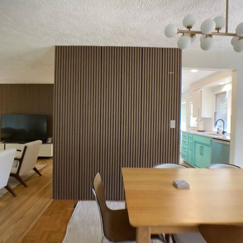 Enjoy meals in around the dining room table with seating for 6-8.