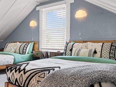 Luxurious bedding with platform bedframes create ample room for a restful night's sleep.  The perfect sanctuary for a rejuvenating stay.