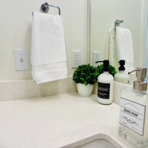 Amenities include 100% natural soaps and lotion, plush hygrocotton bath and hand towels, washcloths, and makeup cloths.