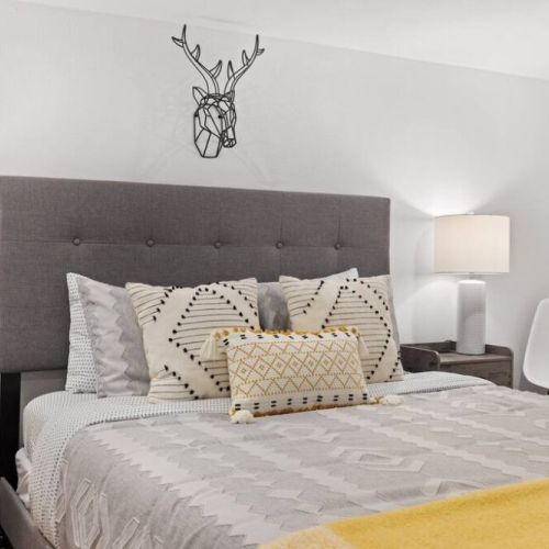 Queen-sized comfort in the basement room offers unparalleled relaxation to wake up refreshed and rejuvenated, ready to seize the day ahead.