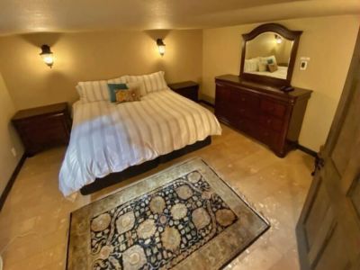 A great nights rest is awaiting you in this lower level King bedroom with a wall mounted TV. Watch your favorite cable shows or stream your favorite apps.