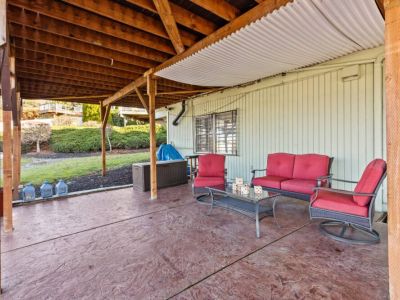 Patio provides additional outdoor space to hang out and play outdoor games