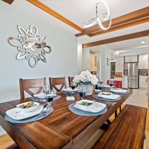 The five chairs and bench combination offer versatile seating options.