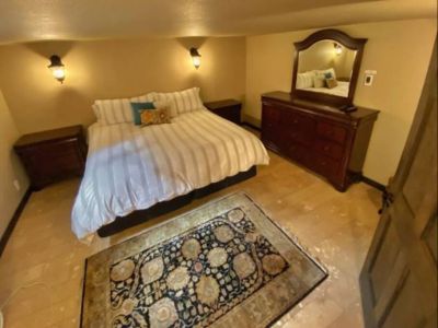 A great nights rest is awaiting you in this lower level King bedroom with a wall mounted TV. Watch your favorite cable shows or stream your favorite apps.