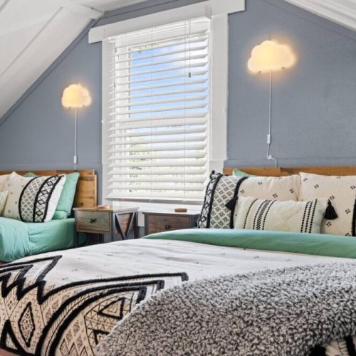 Luxurious bedding with platform bedframes create ample room for a restful night's sleep.  The perfect sanctuary for a rejuvenating stay.