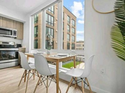 As daylight spills through the window. This dining table becomes a stage for shared moments and culinary delights.