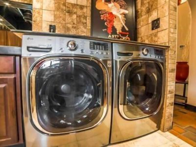 Full-size washer & dryer are conveniently located on the main floor in the Prep Kitchen area.