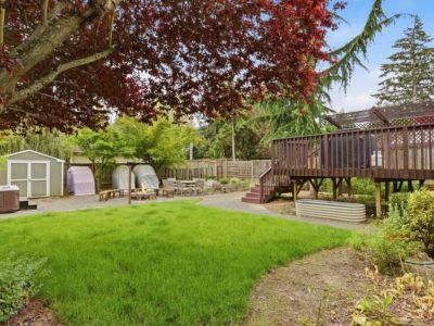 Pets and kids enjoy the fully fenced backyard.