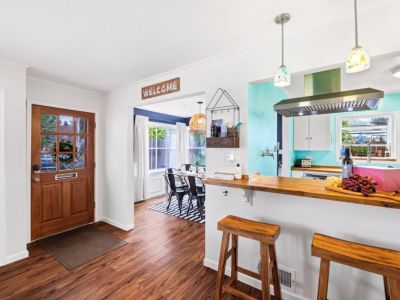 Discover the versatility of our space with an additional dining and/or workspace area, designed to cater to your various needs.