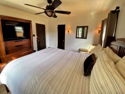 Sink into comfort in this Queen bedroom with cable TV and streaming options.