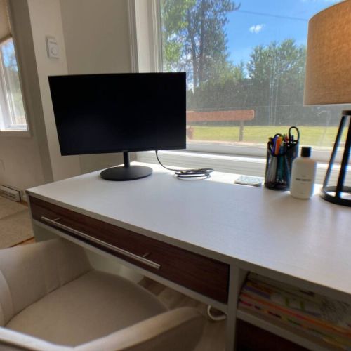 Extra workspace is available with the drop down pull out laptop drawer.