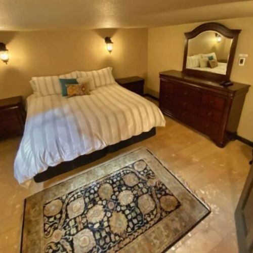 A great nights rest is awaiting you in this lower level King bedroom with a wall mounted TV. Watch your favorite cable shows or stream your favorite apps.
