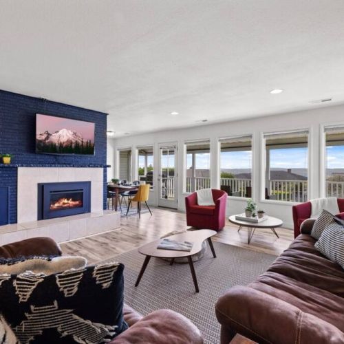 Comfortable seating arrangements and a warm, inviting ambiance makes this living room the heart of the home.