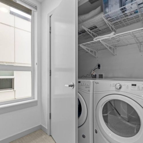 Upper Floor: Laundry Closet & KIng En Suite