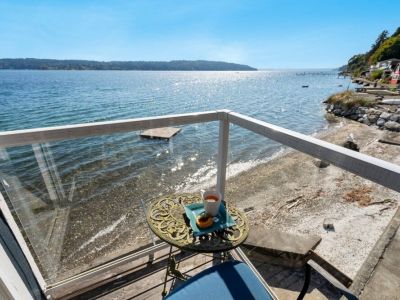 A private balcony extends from the  Loft King bedroom, inviting you to step outside and breathe in the salty sea air.