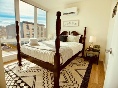 A blissful night of rest awaits in this queen bedroom with luxurious cotton linens.