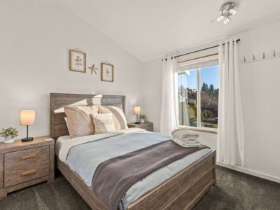 Sink into comfort in this Main Level Queen Bedroom-guests love our 5-star mattresses.
