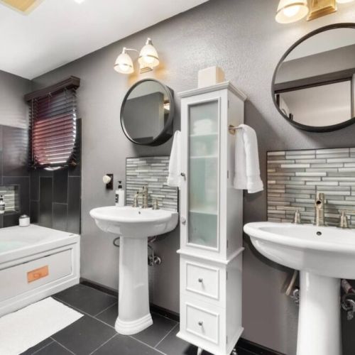 The spacious and beautifully designed the en suite full bathroom of the king bedroom.