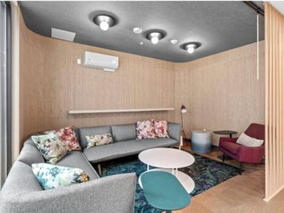 This common living room area transforms into a vibrant hub of shared experiences and connections.