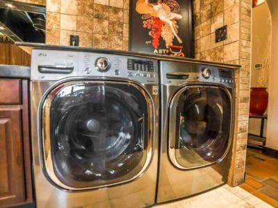 Full-size washer & dryer are conveniently located on the main floor in the Prep Kitchen area.