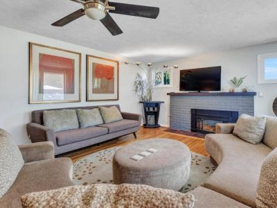 Unwind in the utmost comfort in our inviting living room, featuring ample seating options for everyone to gather and relax.  Find your perfect spot and make lasting memories.