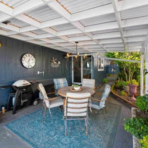 Our covered patio with grill that will delight any barbecue enthusiast rain or shine.