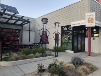 Shop locally sourced organic groceries at Main Market...within walking distance. Dine-in & Take-out options.
