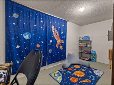 Ignite your child's imagination in this spaciously designed playroom, where kids can explore and play to their hearts' content. With a plethora of games and activities at their fingertips for endless entertainment and fun