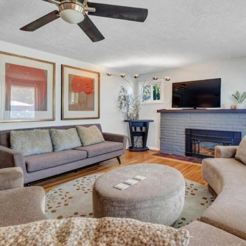 Unwind in the utmost comfort in our inviting living room, featuring ample seating options for everyone to gather and relax.  Find your perfect spot and make lasting memories.