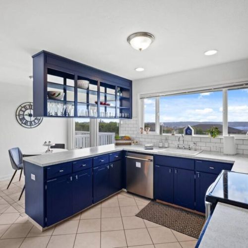 A fully stocked kitchen with culinary possibilities, showcasing an array of cookware, utensils, and ingredients. Home cooked meals are just the best!