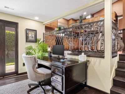 Boost your productivity in this dedicated workspace, thoughtfully designed to cater to your professional needs. Stay organized and inspired in this designated area, ensuring you have a productive and inspiring work-from-home experience.