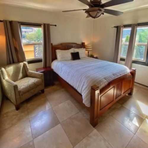 Naturally brightly lit upstairs Queen bedroom has rave reviews for quality matress and linens.