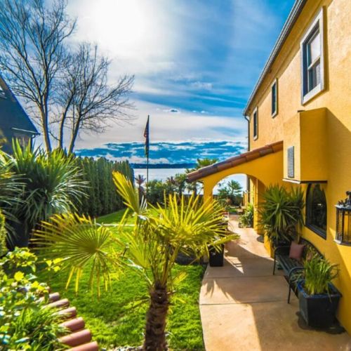 Surrounded by lush greenery and bathed in natural light, this outdoor sanctuary invites you to unwind and enjoy each moment.