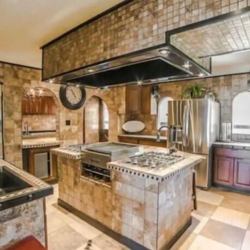 Large kitchen with plenty of space to gather in while cooking and baking family favorites. This culinary sanctuary is a haven for gastronomic adventures...