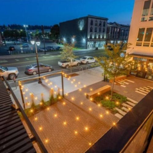 View of the street level patio from the 2nd floor rooftop deck.